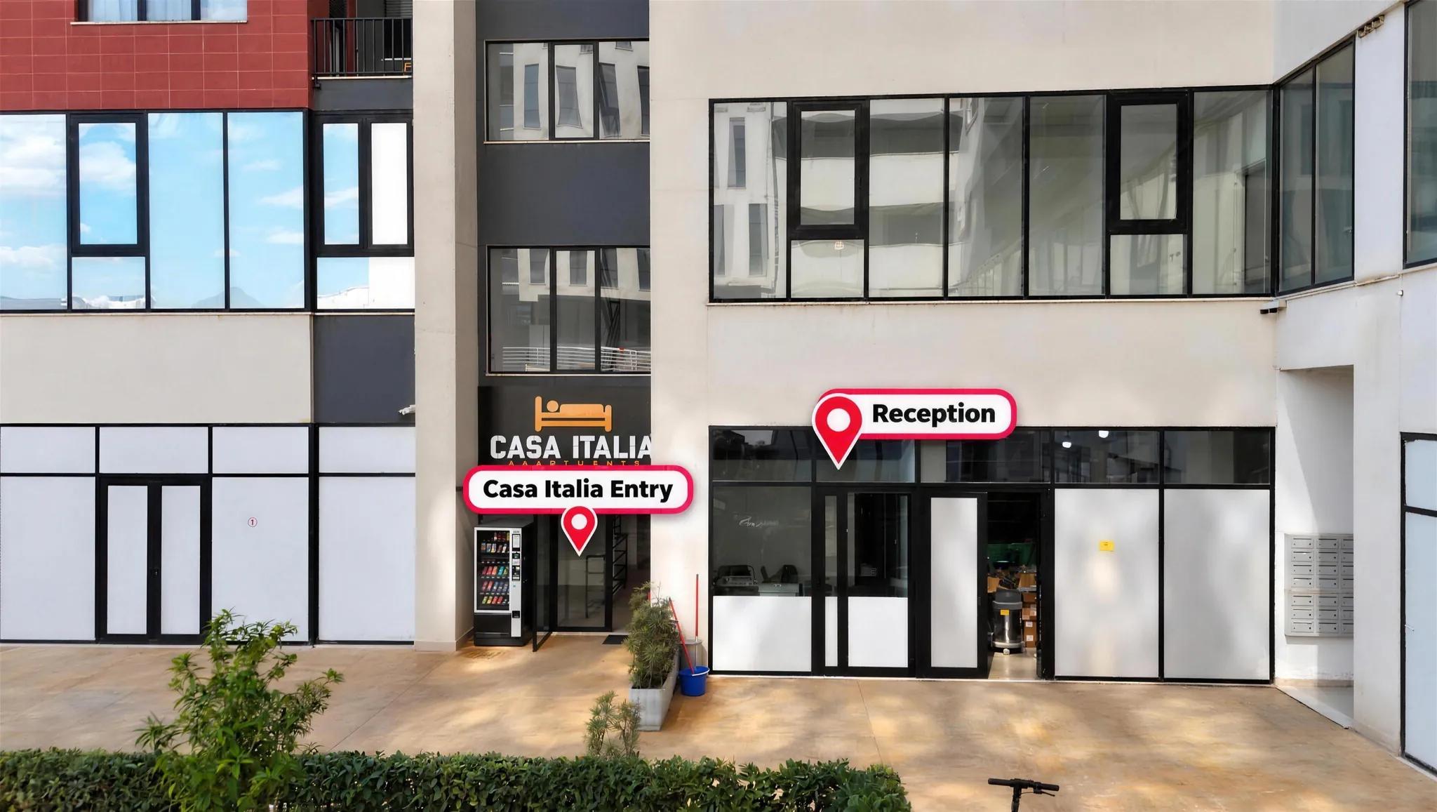 Casa Italia Apartments building on Rruga Pavarësia, with the Casa Italia entry and the glass reception door marked